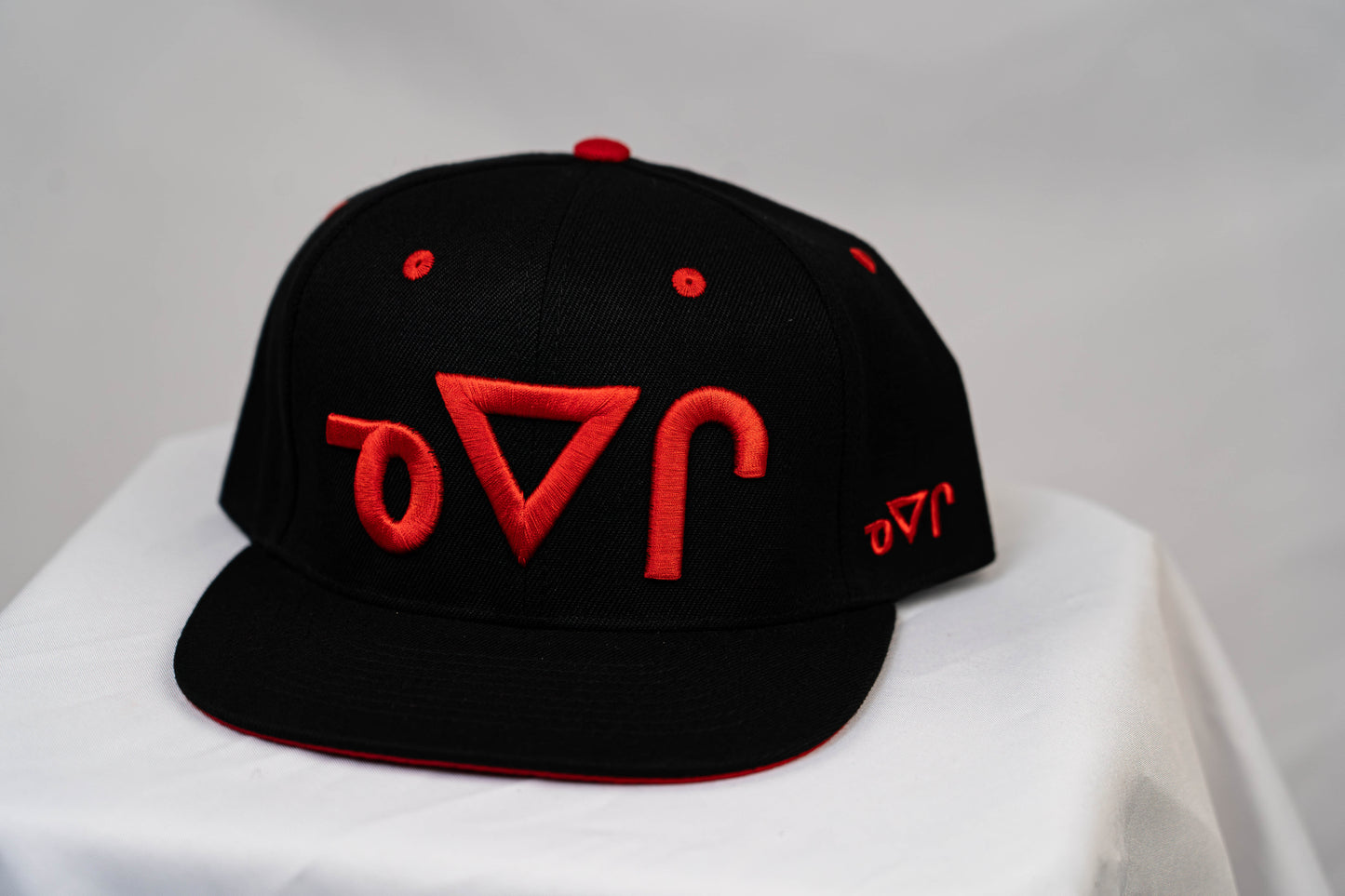Red-on-Black Neechi Syllabic Snapback